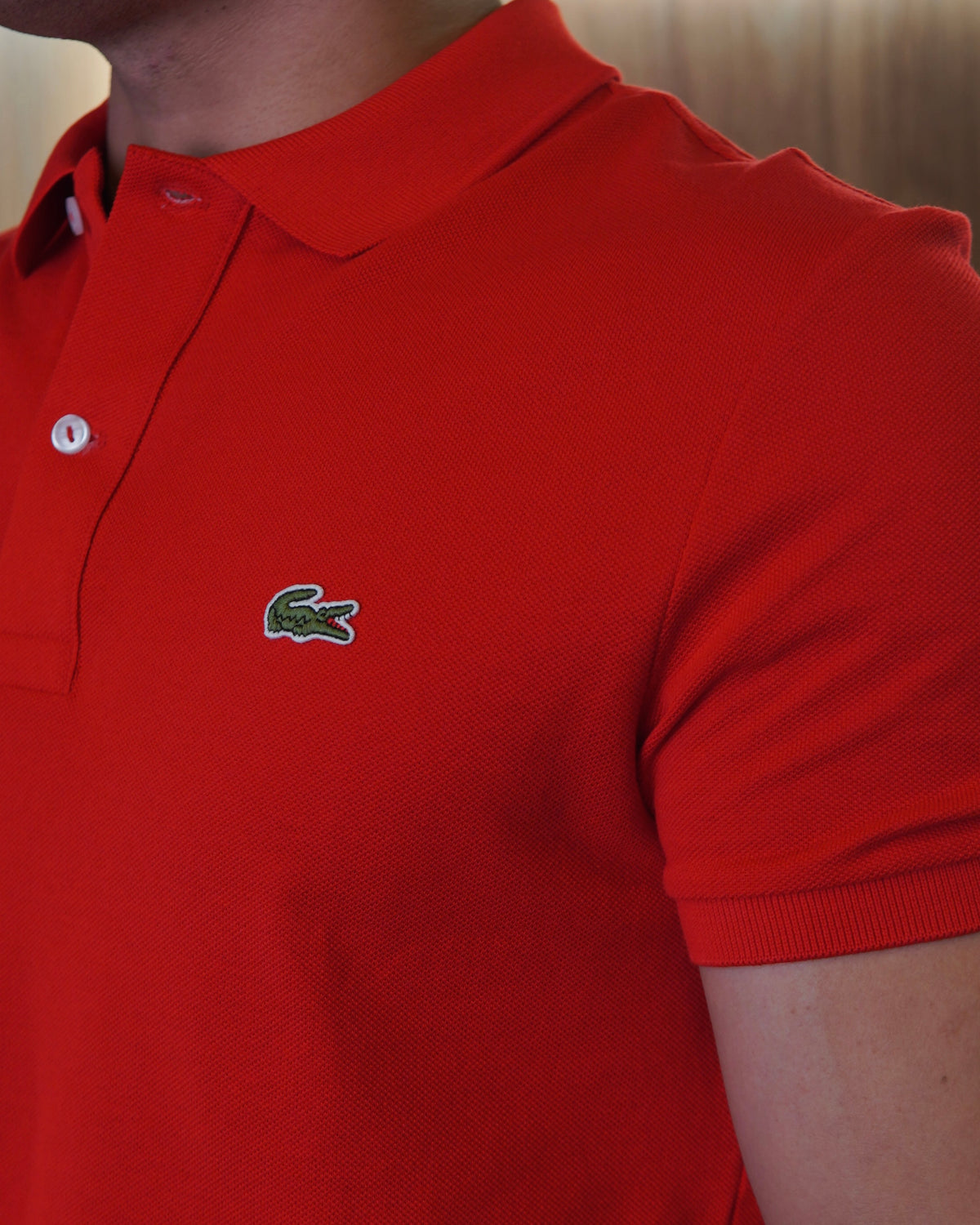 POLO SLIM FIT EM PIQUÉ LACOSTE VERMELHA