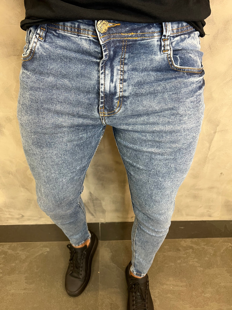 CALÇA JEANS SKINNY C BAINHA DGN MARMORIZADO